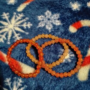 Handmade three piece pretty cute colorful bright orange bracelet set